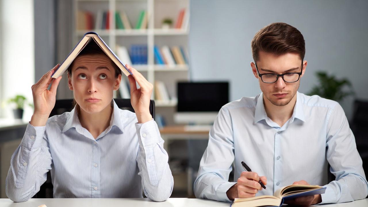 Two professionals demonstrating different learning styles - accidental and deliberate learning in the workplace